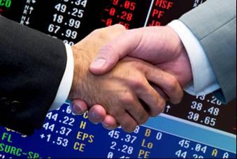 hand shake with stock quotes depicts stock broker image